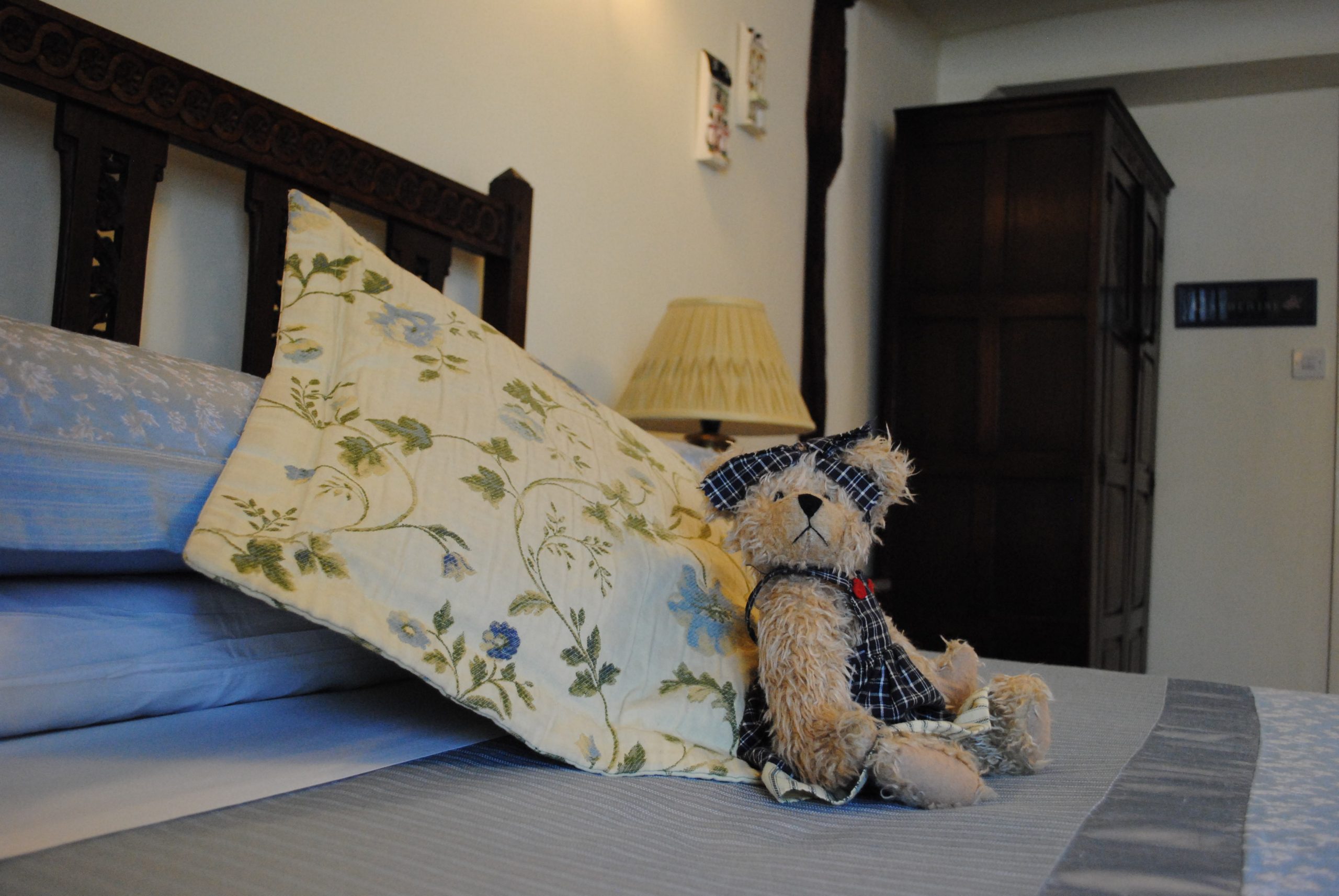 teddy bear on double bed in catherine room